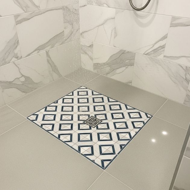 Make your shower floor a masterpiece with patterned tile drains
